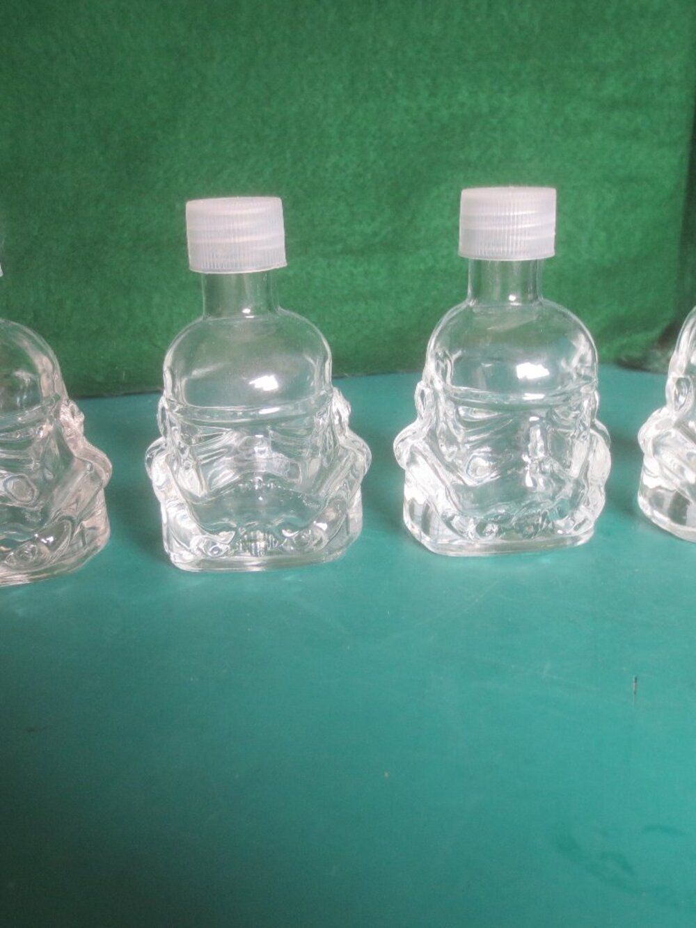 4 Mini Star Wars Stormtroopers Hot Sauce Bottles.